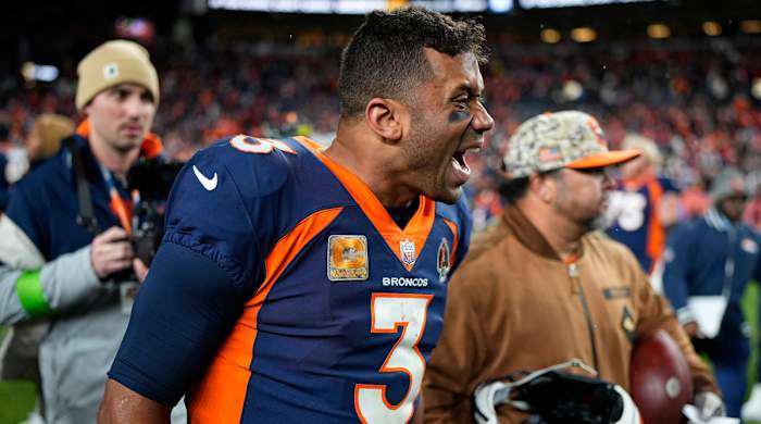 Broncos quarterback Russell Wilson celebrates after a win against the Vikings